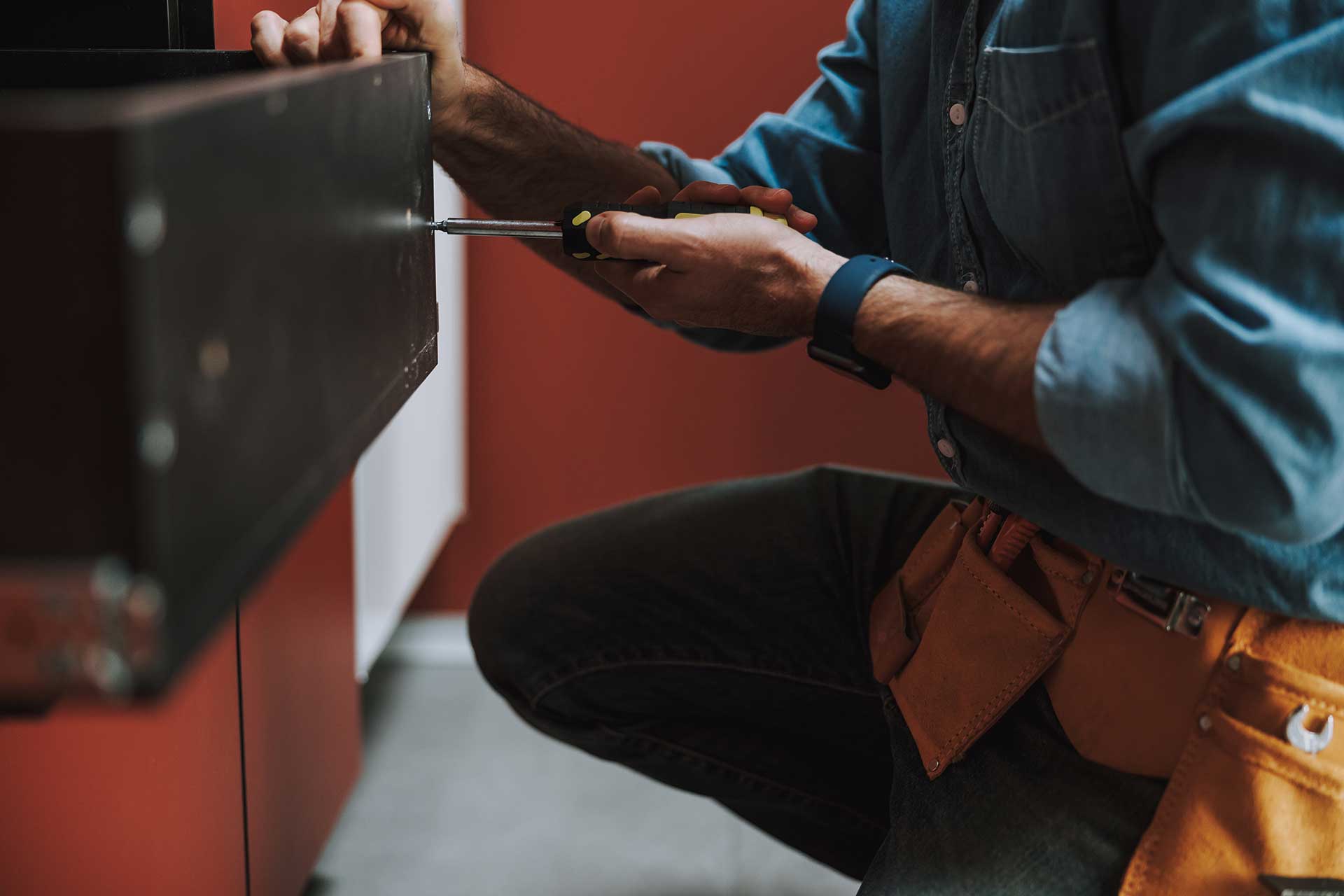 Eminence Handyman Fixing a Drawer
